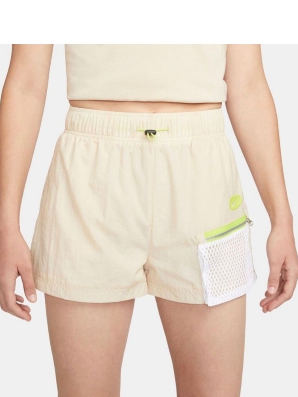 Nike Women's Tan Athletic Shorts with Neon Yellow Accents